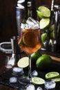 Alcoholic cocktail Long Island with vodka, gin, tequila silver, white rum, liqueur, sugar syrup, lemon juice, cola and ice cubes, Royalty Free Stock Photo