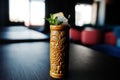 Alcoholic cocktail with mint in originally voodoo earthen glass Royalty Free Stock Photo