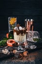 Alcoholic cocktail. Sambuca liqueur, coffee, creamy liquor Royalty Free Stock Photo