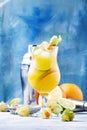 Alcoholic cocktail summer breeze with syrup, lime, orange, beer Royalty Free Stock Photo