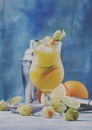 Alcoholic cocktail summer breeze with syrup, lime, orange, beer Royalty Free Stock Photo