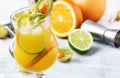 Alcoholic cocktail summer breeze with syrup, lime, orange, beer and ice, selective focus Royalty Free Stock Photo