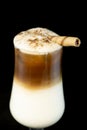Alcoholic coffee cocktail with coffee liqueur, fresh cream and milk