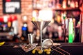 Alcoholic drink on bar counter. Dry martini with ice and olives, served cold in restaurant, bar or pub. Royalty Free Stock Photo