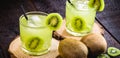 alcoholic drink based on kiwi and Aguardente  cocktail based on distilled drink and fruits  called caipirinha in Brazil and in Royalty Free Stock Photo