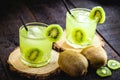 alcoholic drink based on kiwi and Aguardente  cocktail based on distilled drink and fruits  called caipirinha in Brazil and in Royalty Free Stock Photo