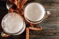 Alcoholic drink, 2 beer with foam, croutons on a dark background Royalty Free Stock Photo