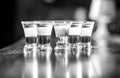 Alcoholic drink in different colors. Shots at the bar table. Alcoholic drinks in shot glasses. Tequila shots, vodka Royalty Free Stock Photo