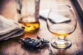 Alcoholism. Cup cognac or brandy hand man the keys to the car and irresponsible driver