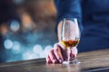 Alcoholism. Hand alcoholic or barman and drink the distillate br Royalty Free Stock Photo