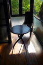 Alcove with furniture and garden view