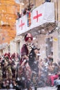 Alcoy, Spain - April 22, 2016: People dressed as Christian legion marching in annual Moros y Cristianos parade in Alcoy, Spain on