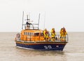 The Lifeboat crew standing on the bow of the Aldeburgh Lifeboat. UK