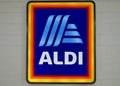 The Aldi logo on the wall of a shopping mall