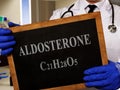 Aldosterone hormone with formula on the blackboard