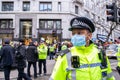 ALDWYCH, LONDON, ENGLAND- 6 December 2020: Police and protesters at the Kisaan protest outside India House