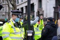 ALDWYCH, LONDON, ENGLAND- 6 December 2020: Protester clashing with police at the Kisaan protest outside India House