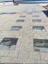 Aleja statkow pasazerskich, Gdynia, Poland. Plates with the names of pasangers ships in the pavement.