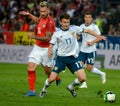 Aleksandr Golovin against Austrian midfielder Peter Zulj