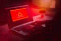 Alert system warning hacked on laptop. Cyber attack on computer network, Virus, Spyware, Malware or Malicious software. Cyber