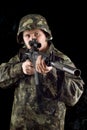 Alerted soldier keeping a gun Royalty Free Stock Photo