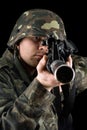 Alerted soldier pointing m16 in studio Royalty Free Stock Photo