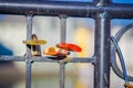 ALESUND, NORWAY, APRIL, 04, 2018: Close up of dozens of padlocks of love on the bridge