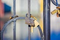 ALESUND, NORWAY, APRIL, 04, 2018: Close up of dozens of padlocks of love on the bridge