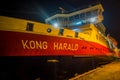 ALESUND, NORWAY - APRIL 04, 2018: Outdoor view of Hurtigruten coastal vessel KONG HARALD, is a daily passenger and