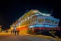 ALESUND, NORWAY - APRIL 04, 2018: Outdoor view of Hurtigruten coastal vessel KONG HARALD, is a daily passenger and