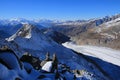 Aletsch Glacier and distant view of the Matterhorn, Weisshorn and other high mountains Royalty Free Stock Photo