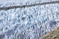 Aletsch Glacier surface with white and blue ice texture structure