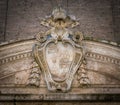 Alexander VII coat of arms on the exterior of the Church of Santo Spirito in Sassia. Rome, Italy.