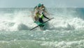 ALEXANDRA HEADLAND, QUEENSLAND, AUSTRALIA- APRIL 24, 2016: the view from the beach of a surf boat race Royalty Free Stock Photo