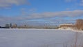 Alexandra Interprovincial bridge over frozen Ottawa river on winter day with snow