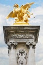 Alexandre III bridge golden statue in Paris Royalty Free Stock Photo