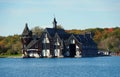 Alexandria Bay, New York, U.S.A - October 24, 2019 - The view of Boldt Yacht House overlooking striking fall foliage along St Royalty Free Stock Photo