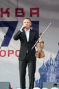 Alexey Alexeyev play on violin during event `Day of the Moscow city` in Znamya Oktyabrya