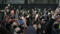 Alexey Navalny supporters on streets with mobile phone lights during rally.