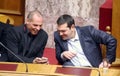 Alexis Tsipras talks with Finance Minister Yanis Varoufakis