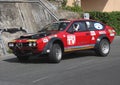 An Alfa Romeo Alfetta GTV racing car during a timed speed trial