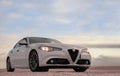 Alfa Romeo Giulia stands in the golden sands of the Namib desert