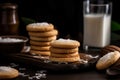 Alfajores coconut cookies with glass of milk. Generate ai