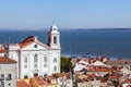 Lisbon, Portugal.Alfama District with Santo Estevao Church and the Tagus River Royalty Free Stock Photo