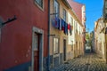 Alfama Lisboa district narrow street colored houses. Lisbon, Portugal Royalty Free Stock Photo
