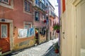 Alfama Lisboa district narrow street colored houses. Lisbon, Portugal Royalty Free Stock Photo