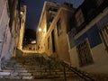 Alfama Lisboa district night narrow street and steps. Lisbon, Portugal Royalty Free Stock Photo