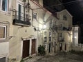 Alfama Lisboa residential narrow street at night. Lisbon, Portugal Royalty Free Stock Photo
