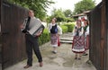 Alfatar, Bulgaria - August 09 2018: A folk song group in the yard of a traditional Bulgarian village house, Silistra Province, the