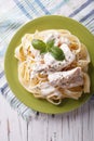 Alfredo pasta in cream sauce with chicken closeup. vertical top Royalty Free Stock Photo